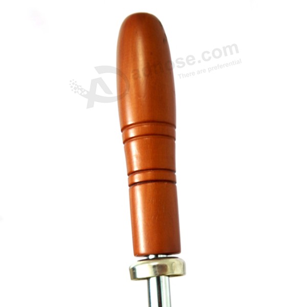 straight wooden handle in coffee color