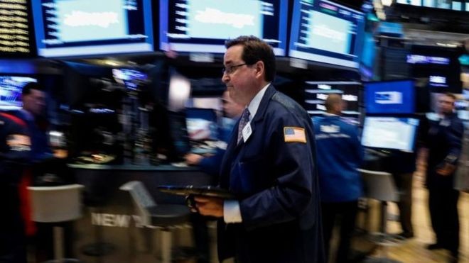 US stocks tick up as missile fear eases