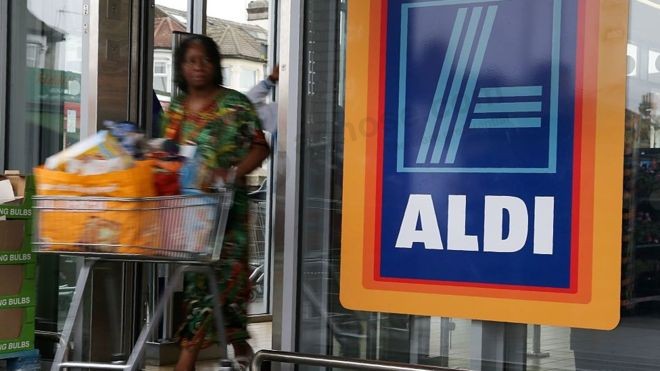 Aldi reports record sales but profits drop amid price war